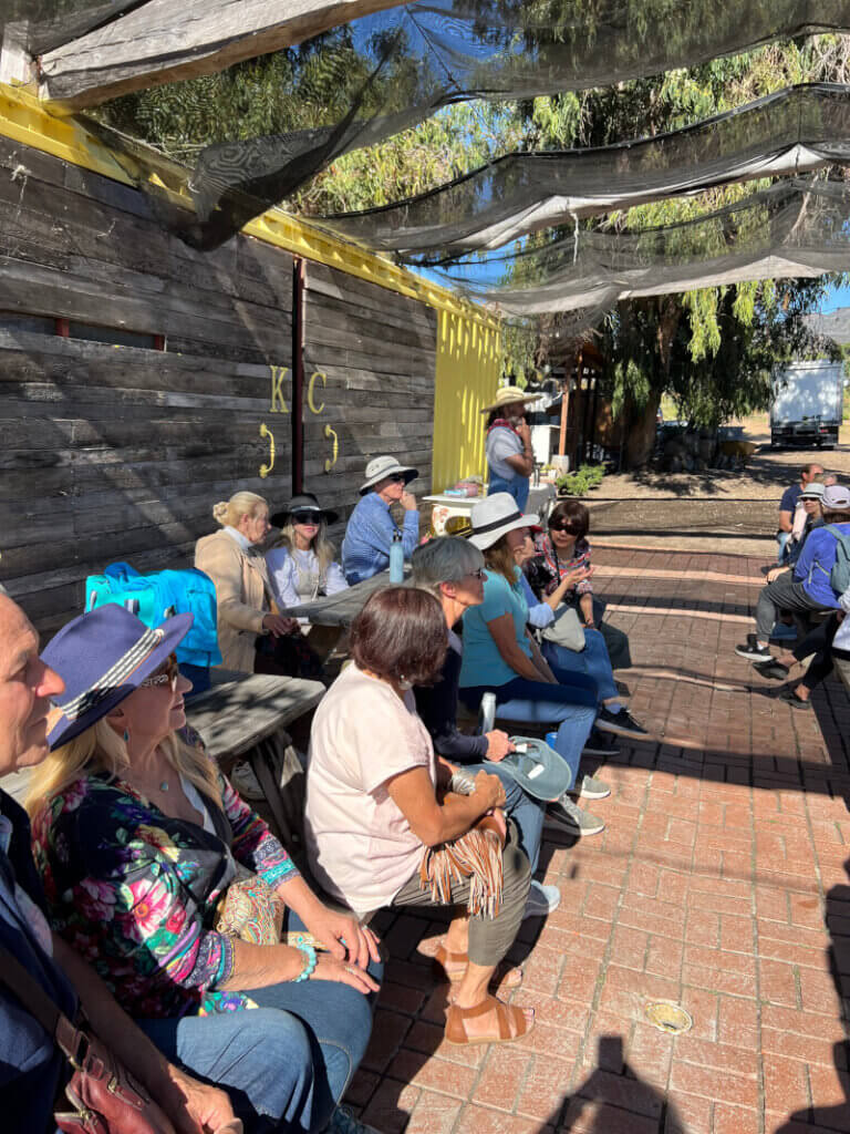 Garden Club members listen to a talk from a staff member of The Sterling Ranch